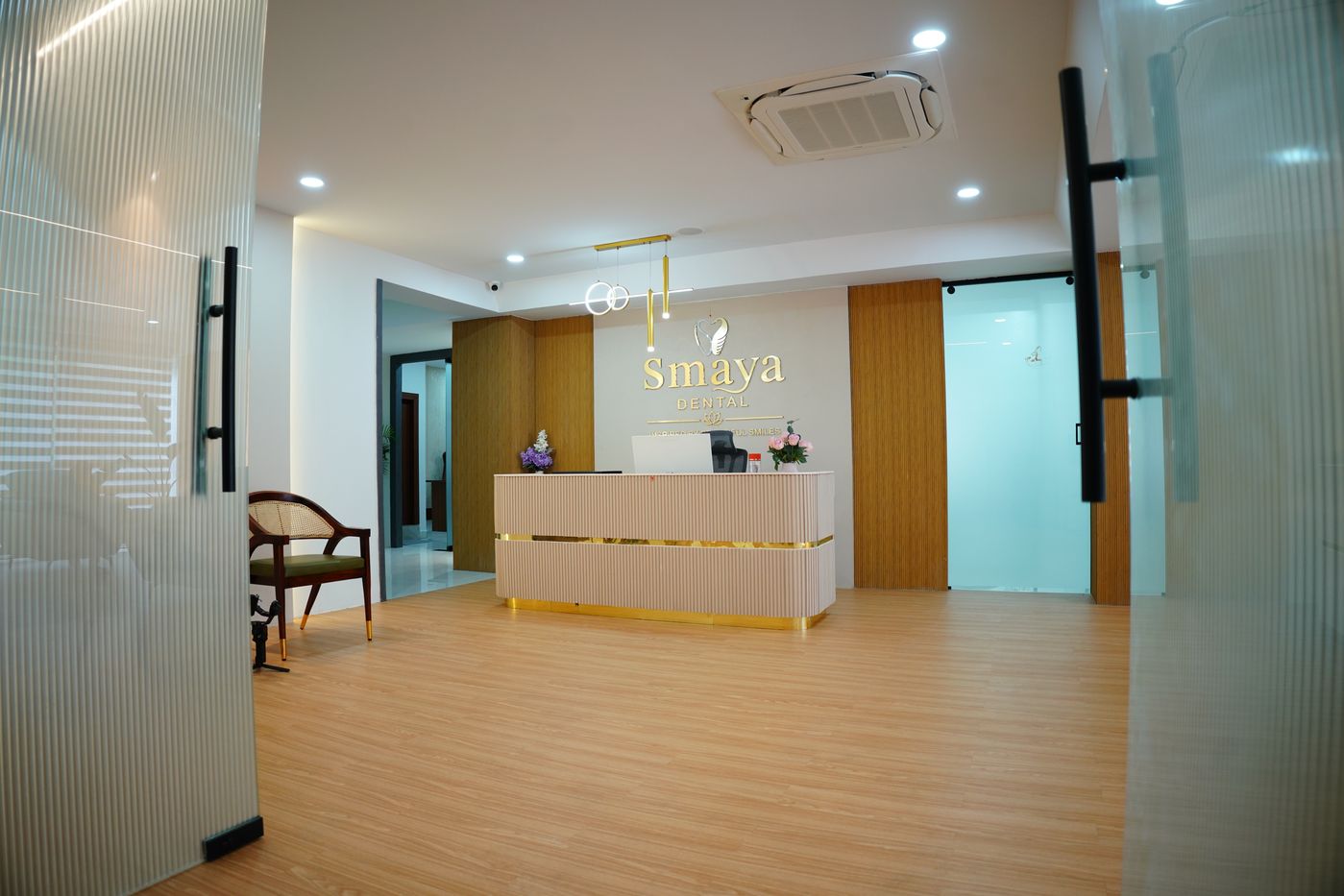 SMAYA Dental Reception and Wall Logo